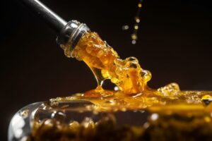 Golden Dab wax on glass surface