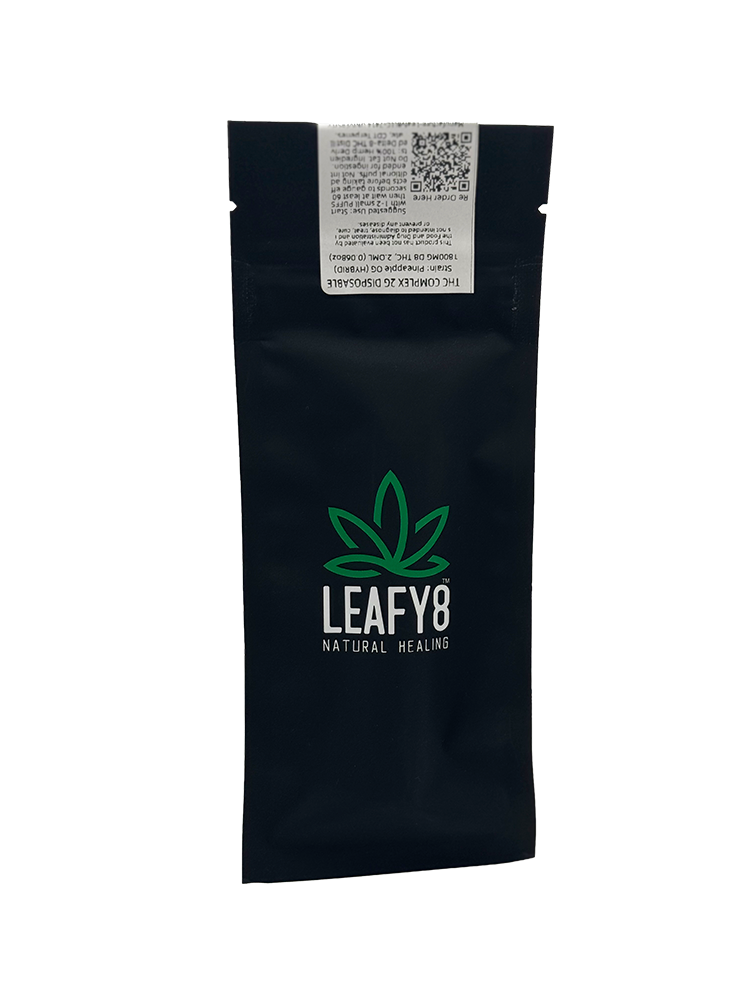 Premium black standby pouch for Leafy8 Natural Healing's 2g THC Complex disposable vapes, showcasing the brand's green leaf logo, a lab-results QR code, and official product compliance details.