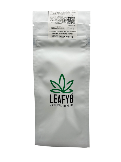 Premium white standby pouch for Leafy8 Natural Healing's 1g Tri-Blend THC vape cartridges, showcasing the brand's green leaf logo, an interactive QR code for batch lookup, and official compliance labeling